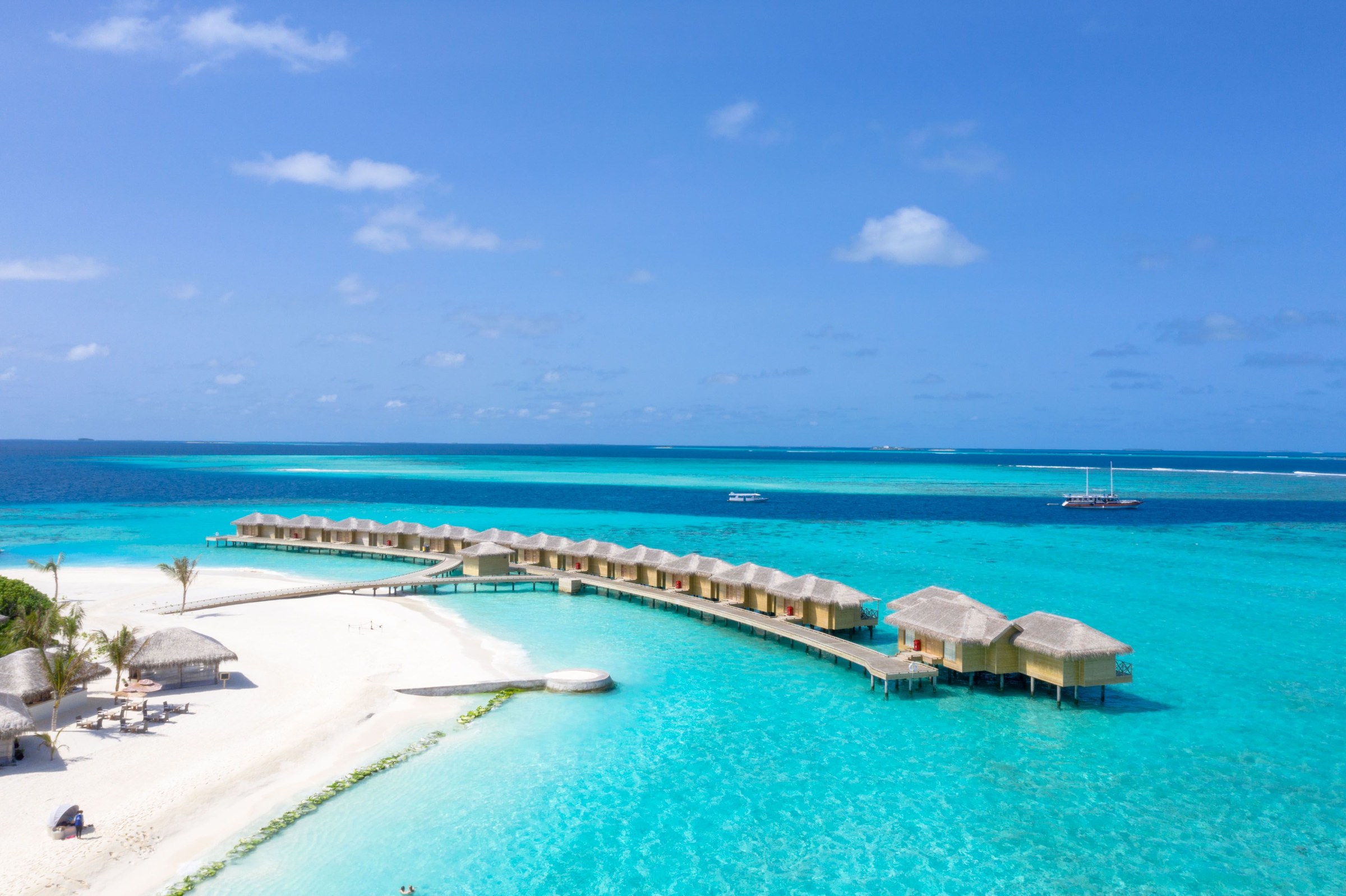 Maldives, overwater villas on a turquoise lagoon